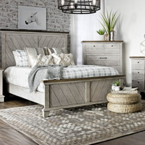 Farmhouse-inspired bedroom set featuring a panel bed, dresser, mirror, chest, and nightstand in a distressed gray finish with rustic wood accents.