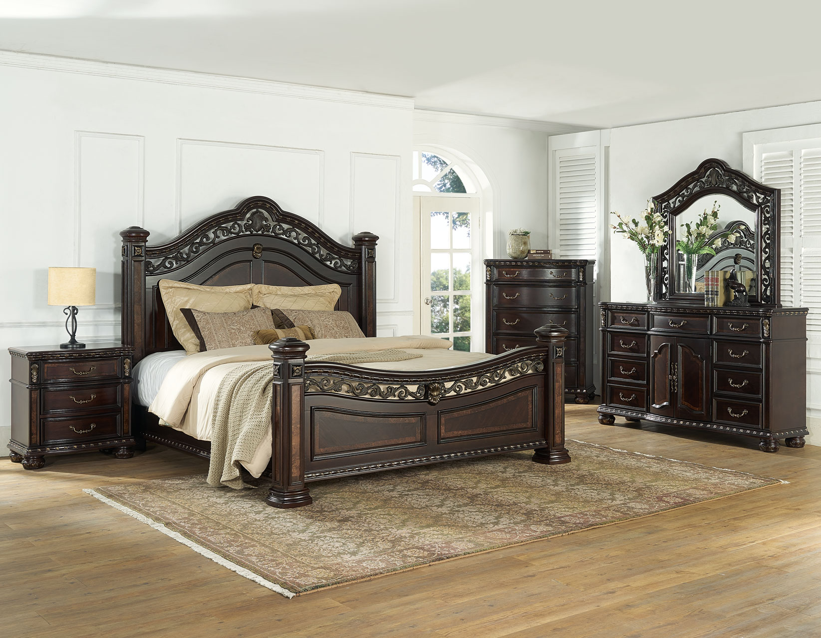 Monte Carlo Bedroom Set featuring an ornate sleigh bed, dresser with mirror, chest, and nightstand in a rich dark cherry finish.