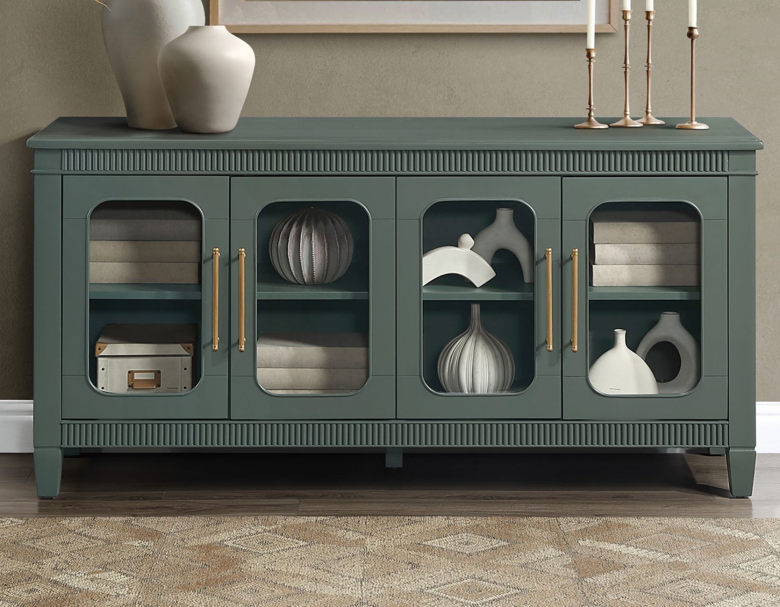 Preston Server in Green finish featuring four glass display doors, gold hardware, and spacious storage shelves.