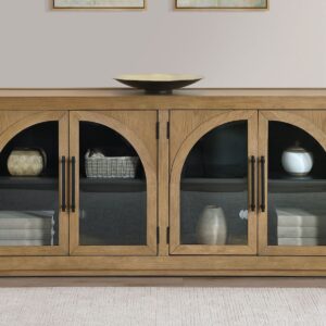 Magnolia server cabinet in weathered sand finish with cathedral-style glass doors, spacious shelving, and farmhouse-inspired design.